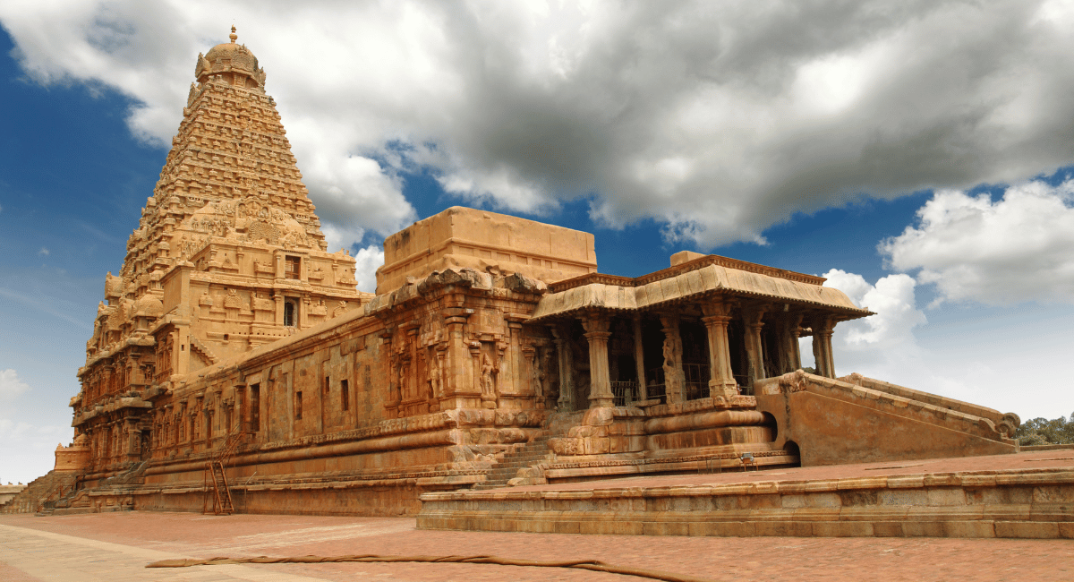 The Brihadeeswarar Temple, located in Thanjavur, Tamil Nadu, is a stunning example of Dravidian architecture and is recognized as one of the  must-visit temples in India.