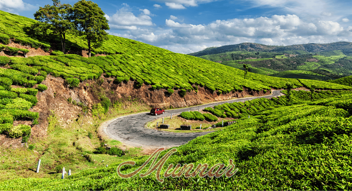 Munnar, located in the Western Ghats of Kerala, is a picturesque hill station renowned for its sprawling tea plantations, rolling hills, and lush greenery